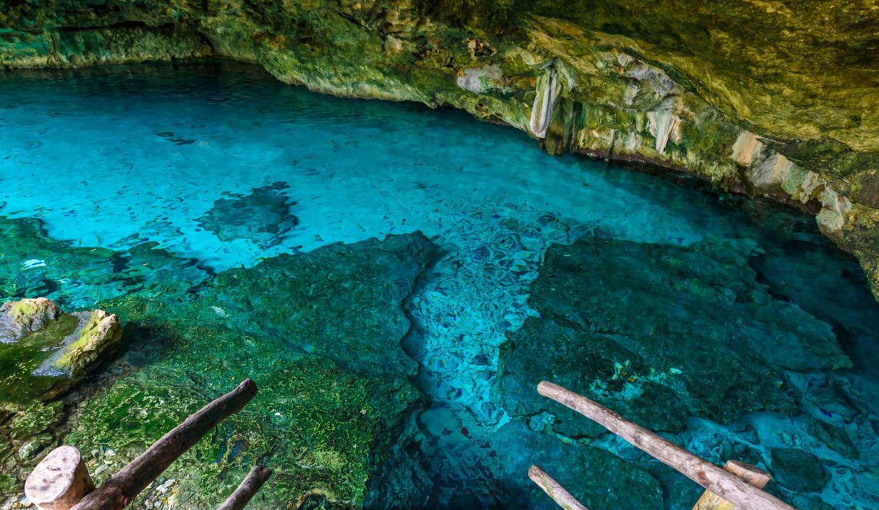 beachfront property Riviera Maya, luxury condos Puerto Morelos, Mexico real estate investment, vacation rental income Mexico, Quintana Roo condos for sale, high ROI-11