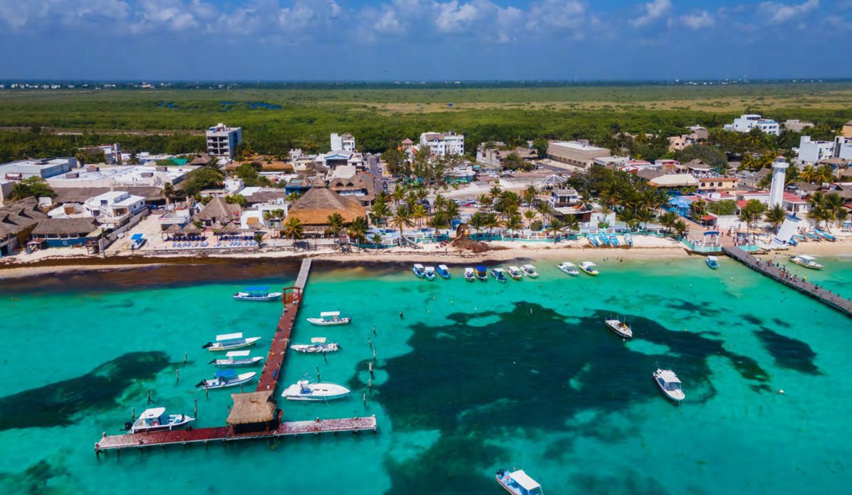 beachfront property Riviera Maya, luxury condos Puerto Morelos, Mexico real estate investment, vacation rental income Mexico, Quintana Roo condos for sale, high ROI-21