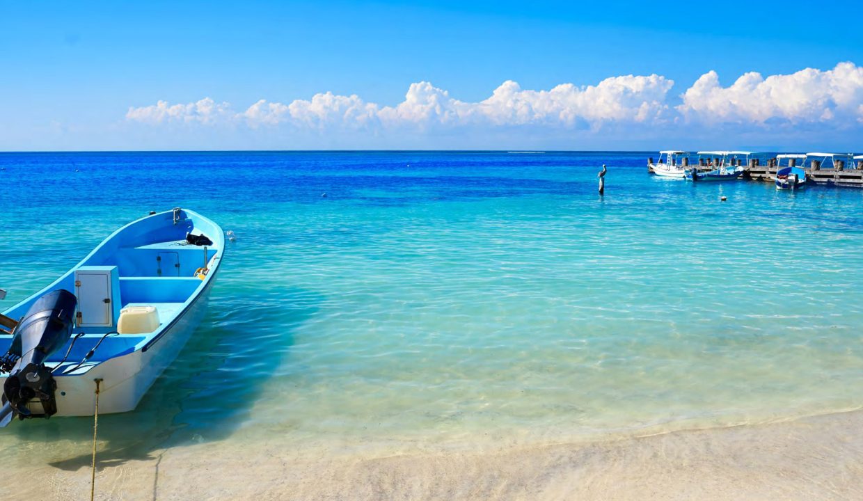 luxury condos Puerto Morelos, beachfront property Riviera Maya, Mexico real estate investment, vacation rental income Mexico, Quintana Roo condos for sale, high ROI-9